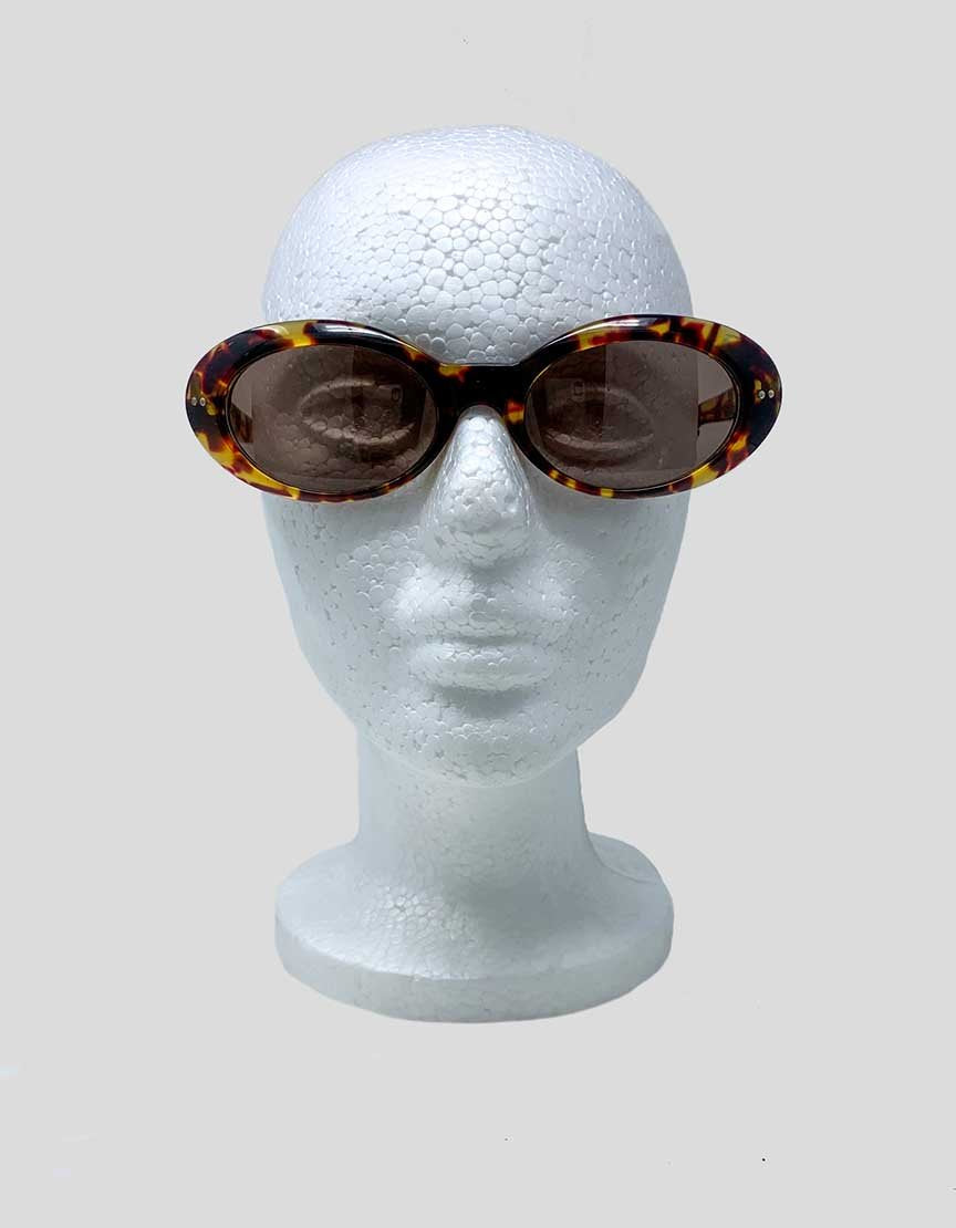Gucci Tortoise Sunglasses In Tortoise With Gucci Branding On Arms