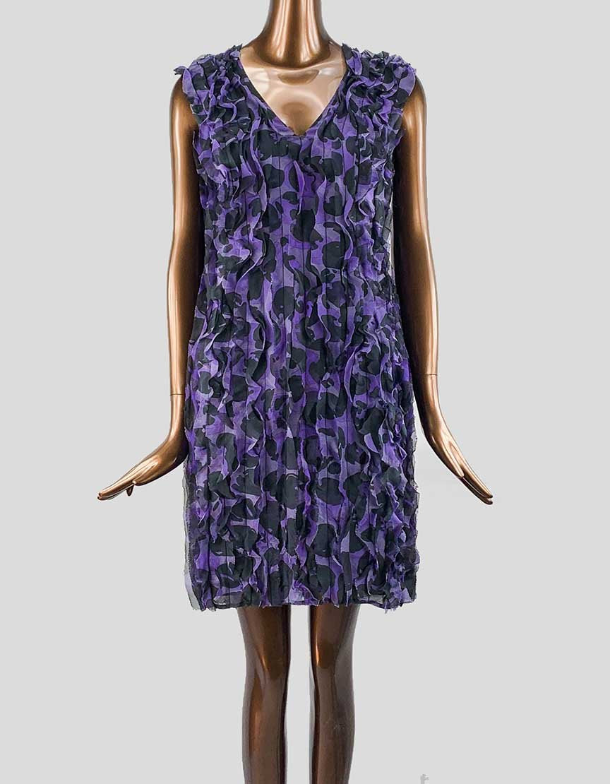 Moschino Cheap and Chic purple and black sleeveless silk mini shift evening dress with ruffle accents and a side zip closure, displayed on a mannequin.