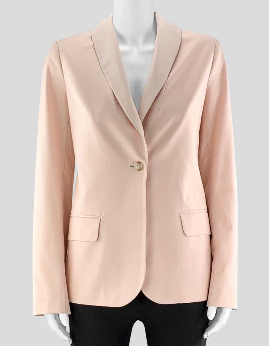 A blush pink Elizabeth and James blazer on a mannequin, showcasing a single-button closure, padded shoulders, buttoned sleeves, and two front flap pockets.