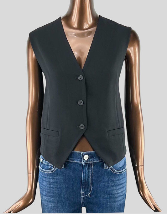 & Other Stories black Sleeveless V-Neck Button Front Short Vest. V-neckline. Sleeveless. 2 front pockets at hips. 