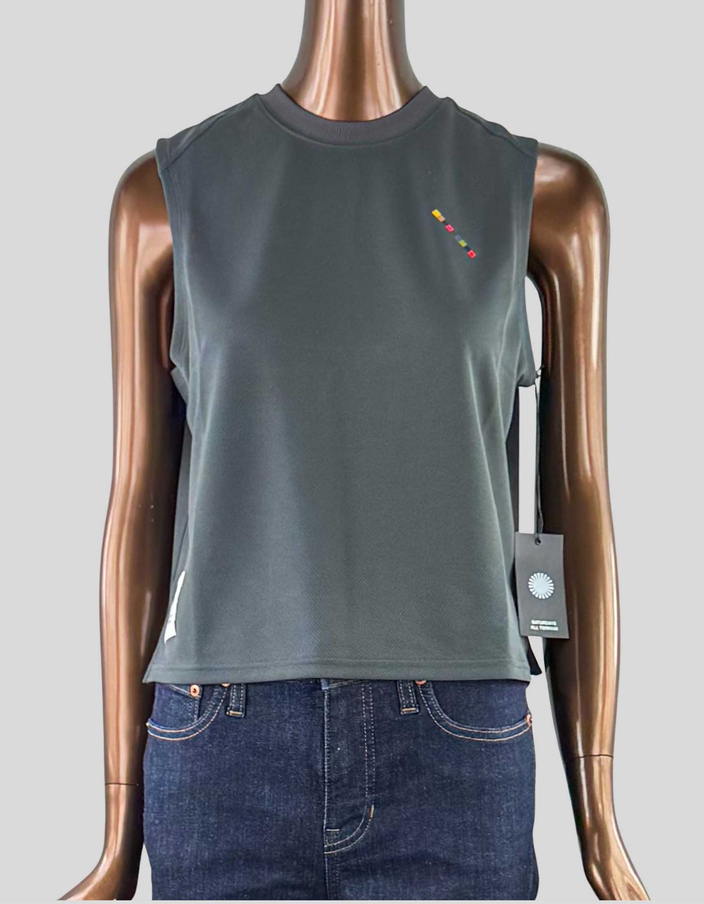 SATURDAYS NYC All Terrain Lightweight Cropped Tank. Crewneck and sleeveless. Self-fabric binding at neck opening and armhole. Rib around neck for extra comfort. Logo at back body and left chest. Reflective printed graphic logo at back neck.