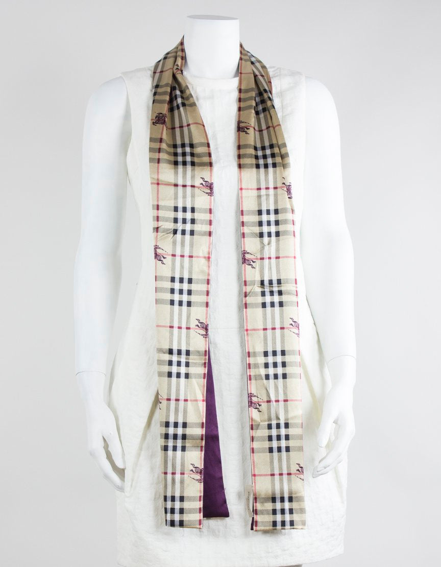 Burberry Scarf With Front Design As The Traditional Plaid With A Purple Burberry Insignia