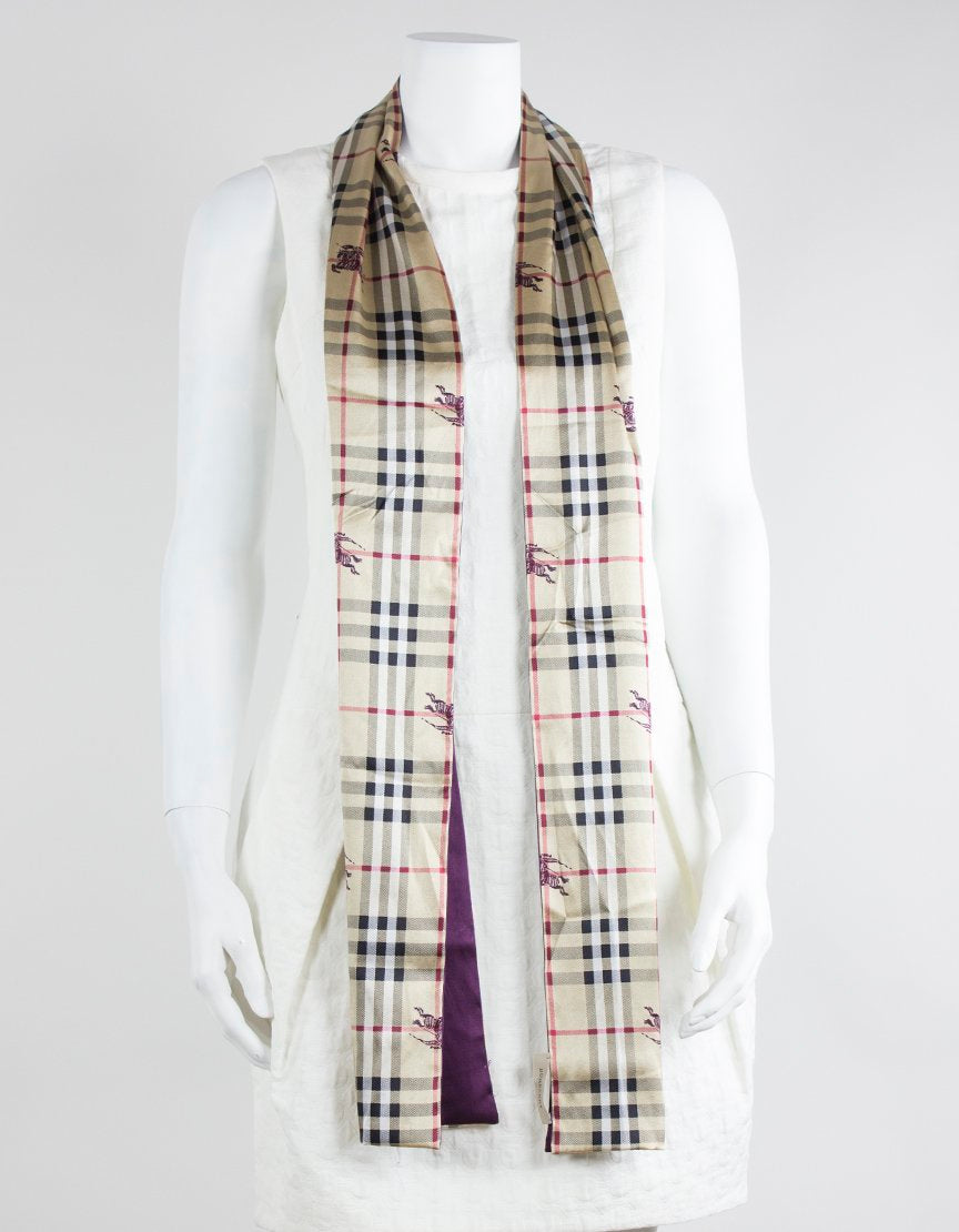 Burberry Scarf With Front Design As The Traditional Plaid With A Purple Burberry Insignia
