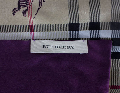 Burberry Scarf With Front Design As The Traditional Plaid With A Purple Burberry Insignia