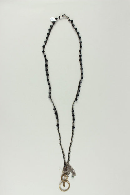 Black Beaded Necklace With Serpent And Leaf Pendent