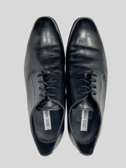 steve madden black dress shoes making them perfect for any formal occasion or professional setting Steve Madden Aahron Black Leather
