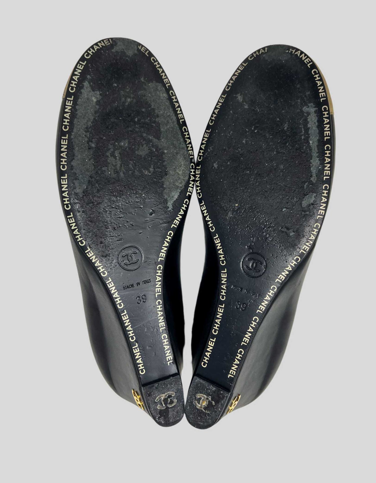 Chanel Black Wedge With Gold Tone Capped Toe With Chanel