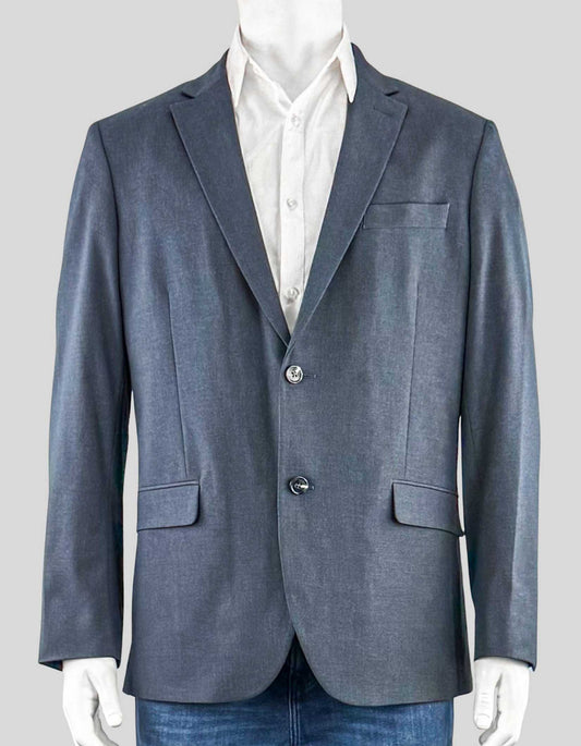 NORDSTROM RACK men's two-button blazer is grey. Notched collar. Wool blend with stretch. Double vent on back. Flap pockets. Lined.