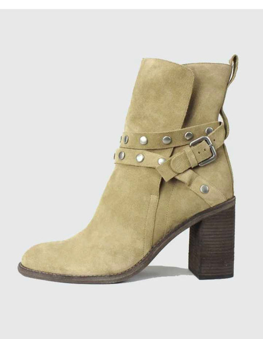 SEE BY CHLOE Bootie Stack boot with wrap around matte silver hardware. Pull-on construction with back tab.