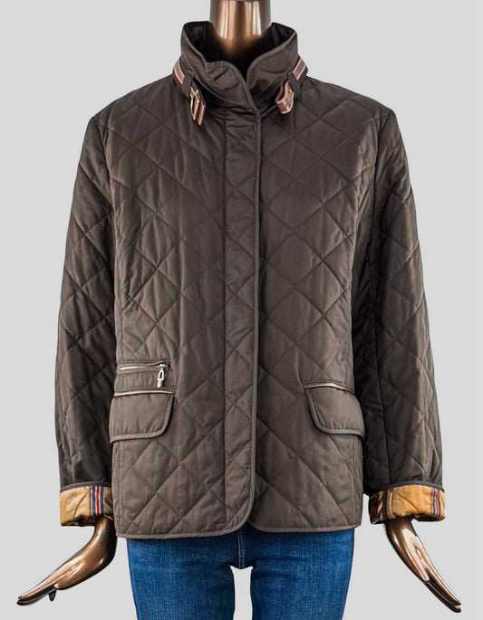 Lauren Jeans Company Brown Barn Jacket. Quilted, patch pocket, stand collar, front pockets, zip and snap front closure, barn jacket with brown leather trim at collar and pockets, and brown horse detail on lining.