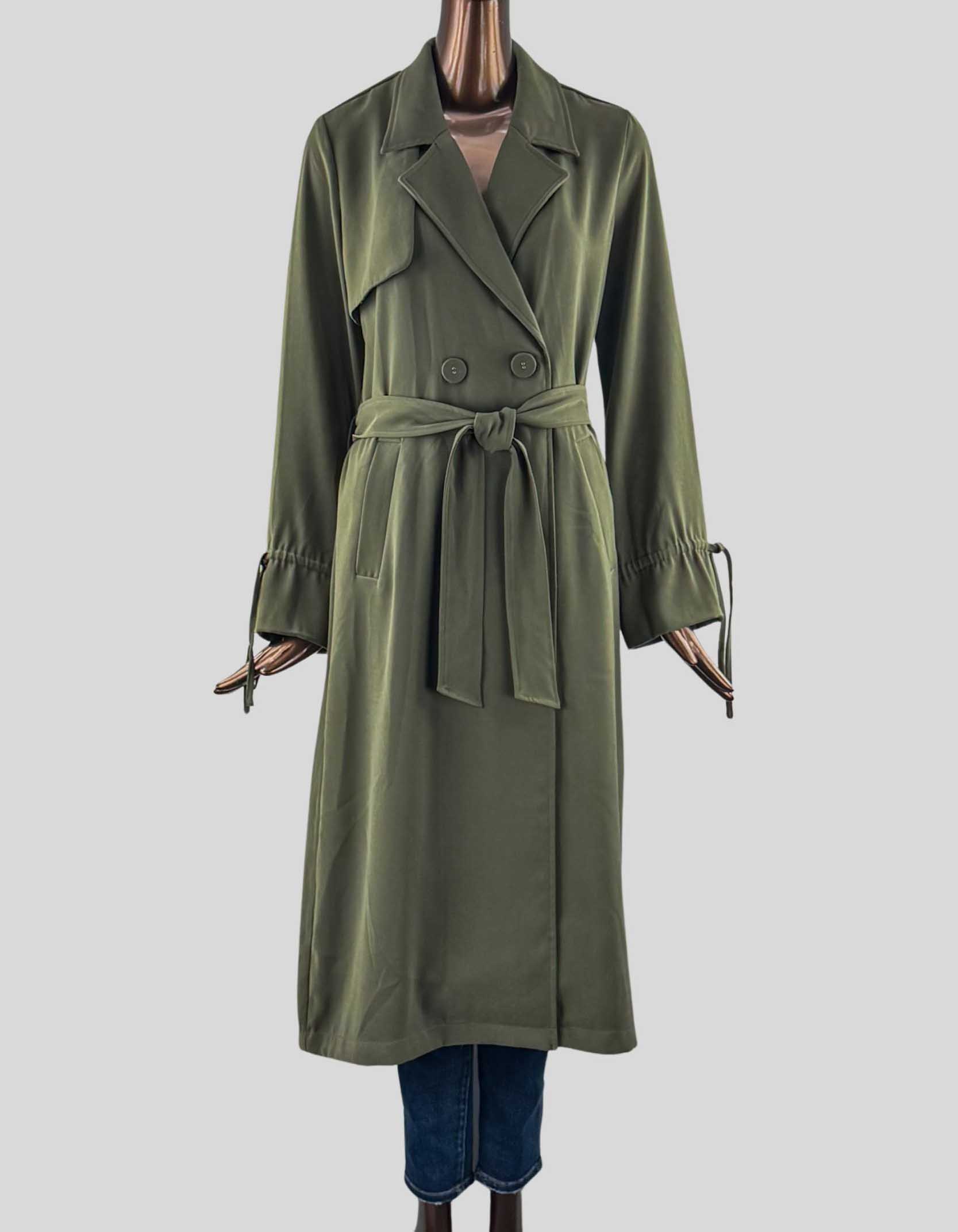 ICŌNE PAR SIMONS VISION Belted Trench Coat. Includes original belt that ties at the waist. Double-breasted, satiny lining, slit pockets, storm flap behind.
