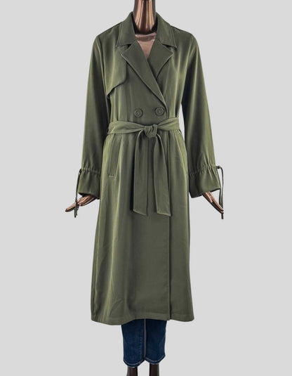 ICŌNE PAR SIMONS VISION Belted Trench Coat. Includes original belt that ties at the waist. Double-breasted, satiny lining, slit pockets, storm flap behind.