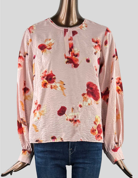RW & Co. long-sleeve blouse. Pink floral pattern, long sleeves with button cuffs, V-neck with hook and eye closure.