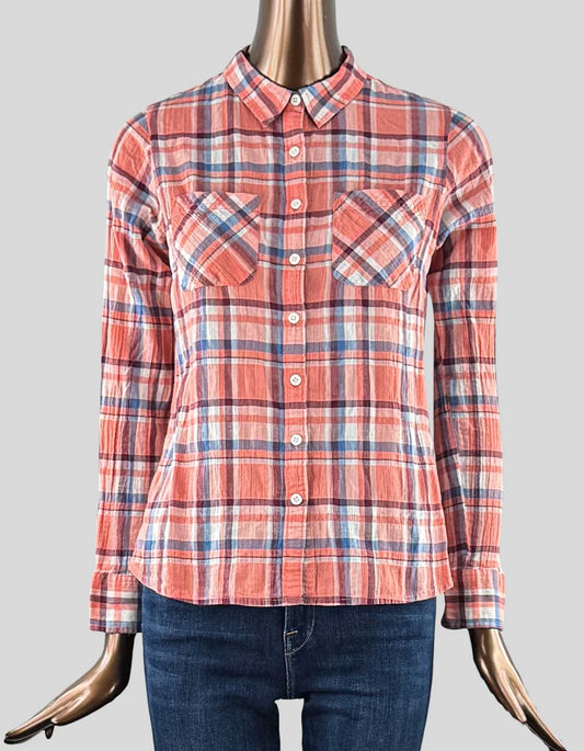 WIND RIVER long sleeve shirt in orange, red, and blue plaid. Fold-down collar. Long sleeve. Button front. Two front pockets.