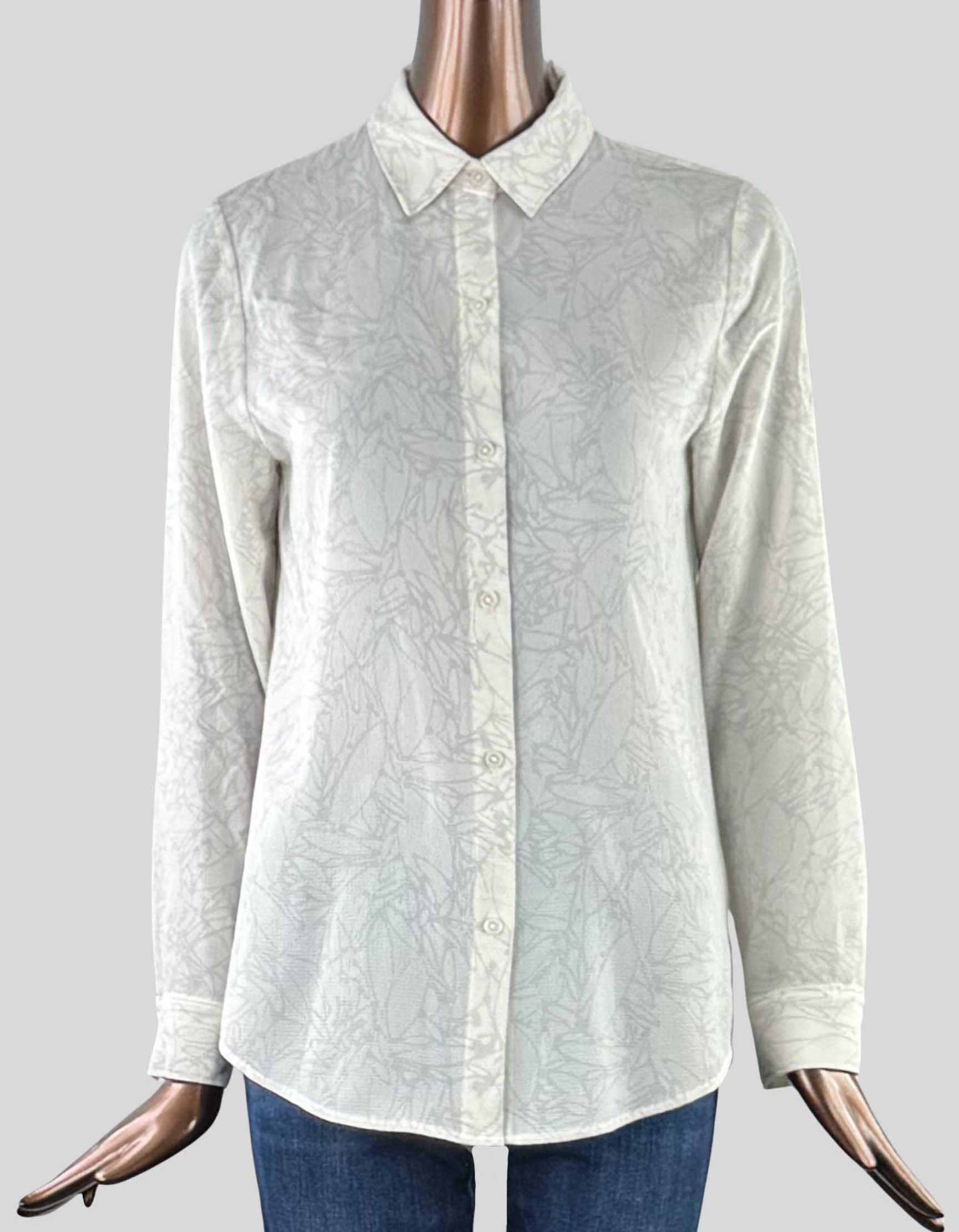 H HALSTON Long Sleeve Cream Patterned Blouse. Button-front closure, long sleeves with button cuffs, and a cream pebble print