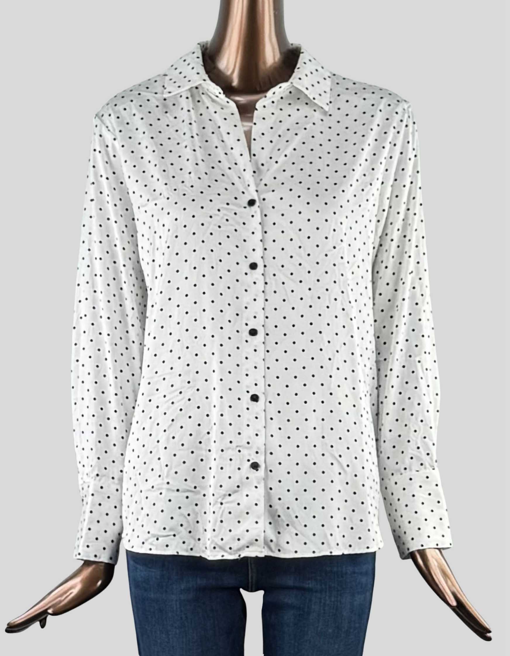 Maison d' Amelie Button Front Blouse in white with black dot design. Spread collar. Long sleeves. 
