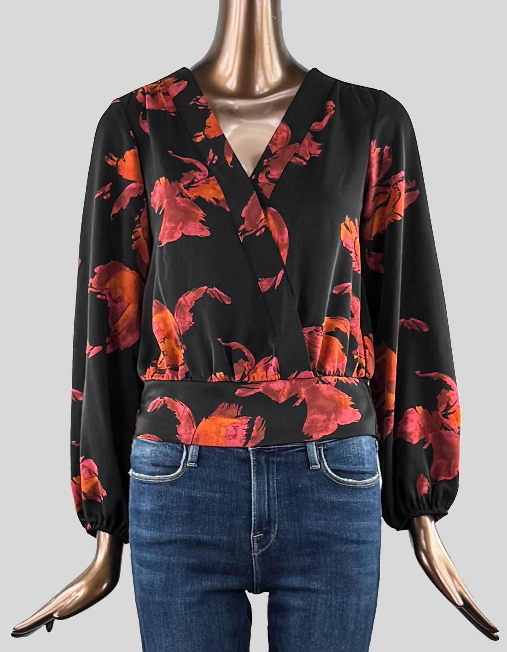 NINE WEST crossover blouse in black with orange and red flowers. Long sleeve with elasticated wrists. Elasticated waistband in back. 