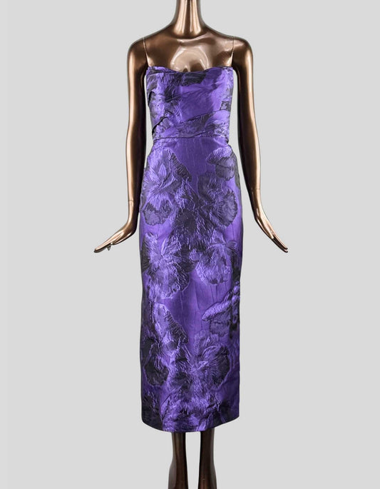 AMSALE Floral Strapless Cocktail Dress with purple on purple floral pattern. Semi-sweetheart neck. Column silhouette. Strapless. Open back. Concealed back zip closure. 