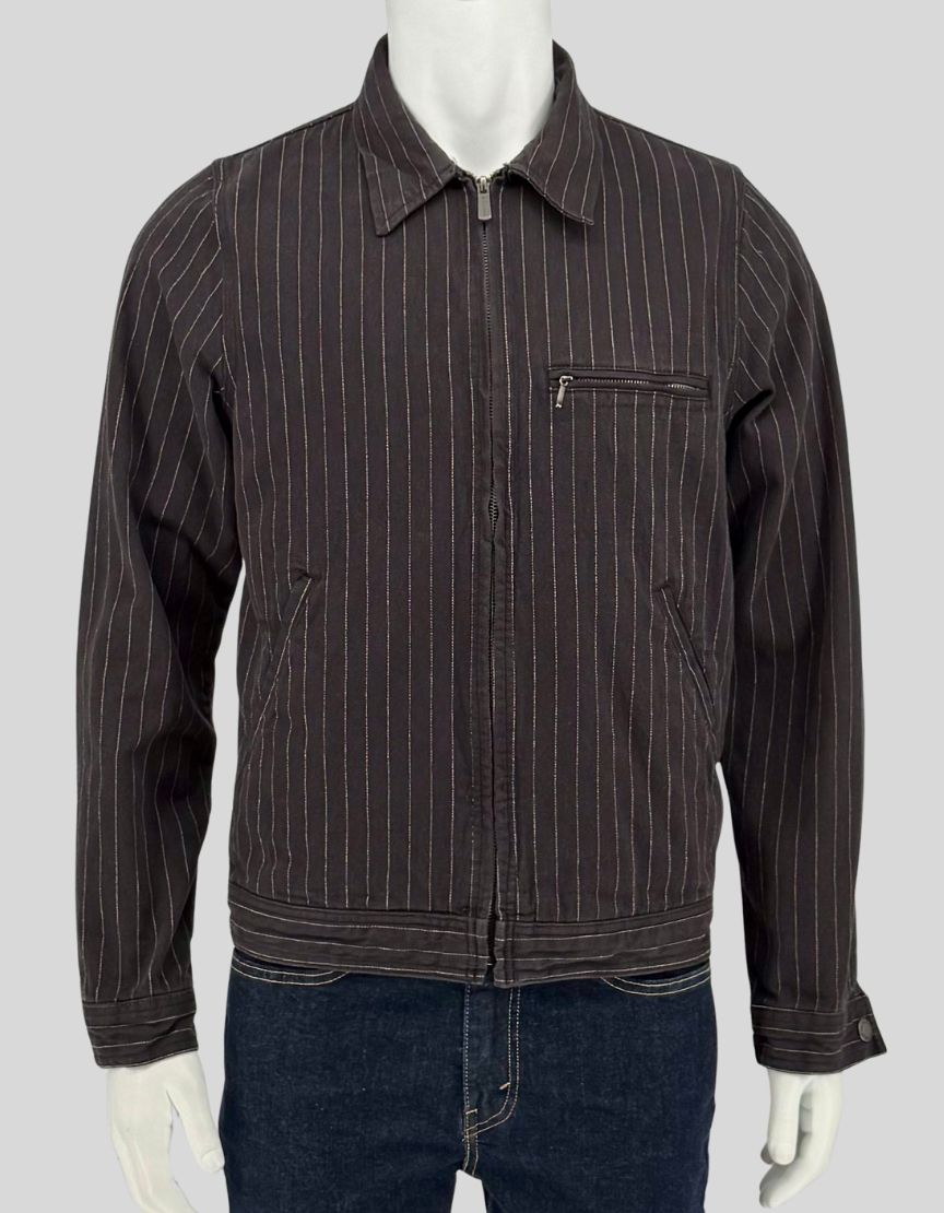 Authentic screen-worn Dickies black cotton twill work jacket featuring white pinstripe pattern, full zip closure, chest pocket, and slash pockets.