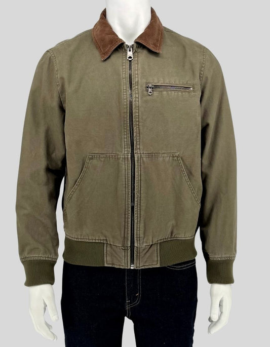 Authentic screen-worn Levi's olive canvas bomber jacket featuring brown corduroy collar, chest zip pocket, front pockets, and ribbed cuffs and hem.