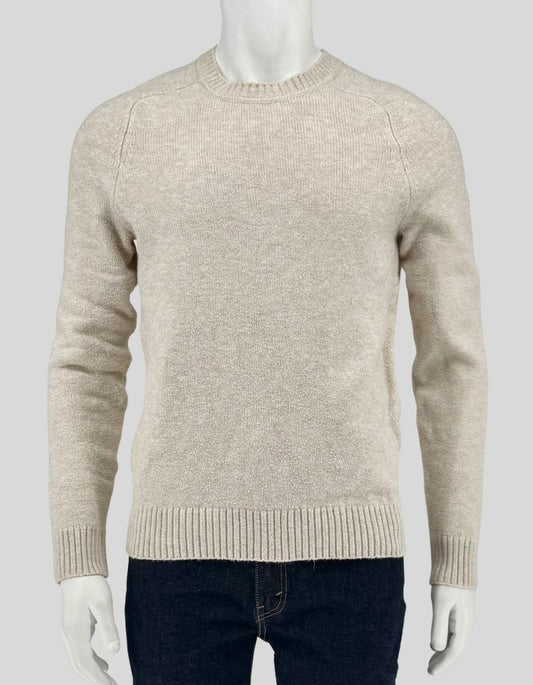 Authentic screen-worn Banana Republic cream heather knit sweater featuring ribbed neckline, cuffs and hem, with raglan sleeve construction.