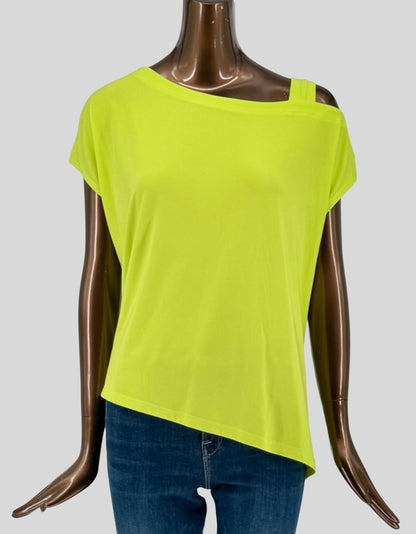 Authentic screen-worn Joseph Ribkoff lime green off-shoulder top featuring asymmetric hemline, cap sleeves, and shoulder strap detail. 