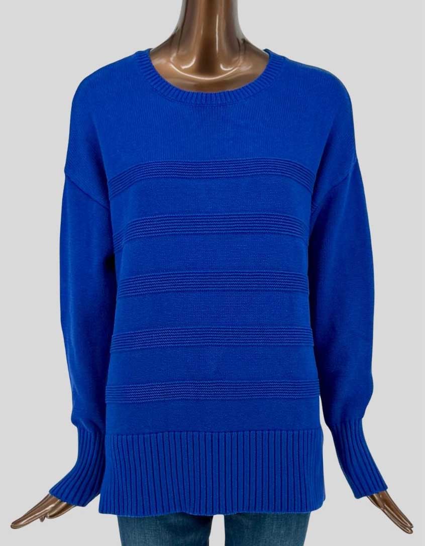 Authentic screen-worn Denver Hayes vibrant cobalt blue sweater featuring subtle tonal striped texture throughout the body. Featuring ribbed trim at the crew neckline, cuffs, and hem, with a relaxed, comfortable fit perfect for layering.