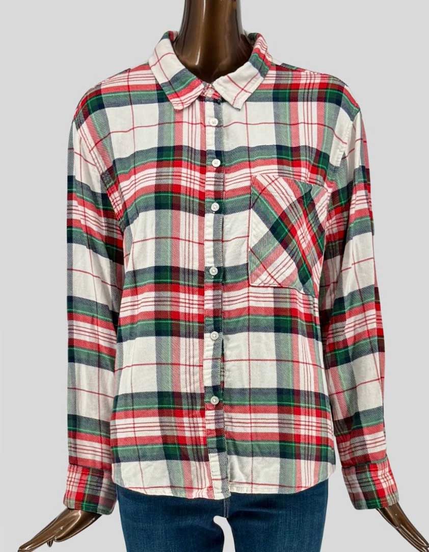 Authentic screen-worn AERIE festive plaid flannel shirt featuring red, green, navy, and cream holiday colors. Button-front design with chest pocket and soft brushed cotton fabric.