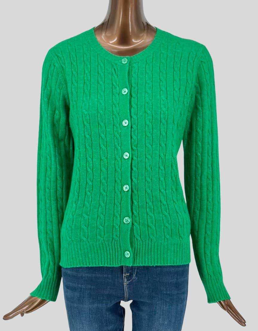 Authentic screen-worn Twik by Simons soft cable-knit crew-neck cardigan in vibrant green. Features recycled cotton blend fabric with classic cable-knit pattern, button-front closure, and ribbed cuffs and hem. 