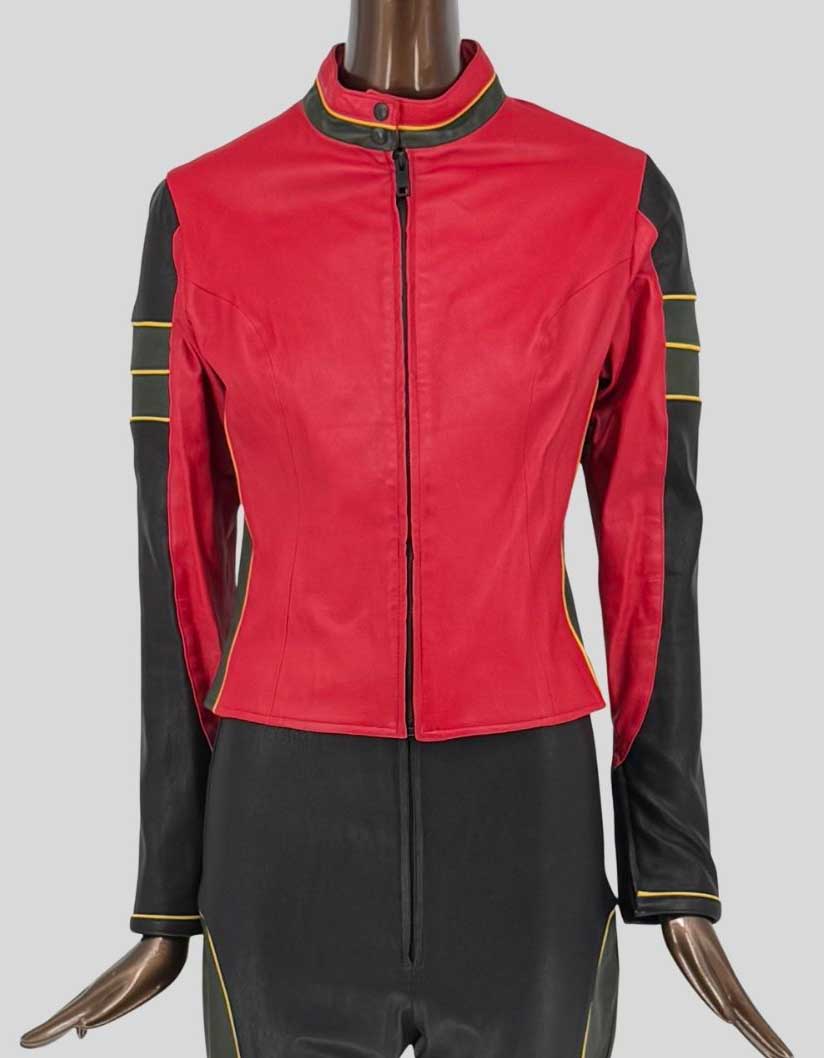 JONATHAN A. LOGAN custom-made red leather jacket featuring black contrast sleeves with yellow piping detail. Fitted moto-style silhouette with stand collar and center front zipper closure.