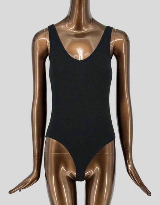 Authentic ATM black ribbed tank bodysuit featuring scoop neckline, sleeveless design, and snap closure at gusset.