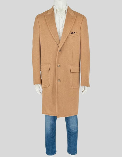BROOKS BROTHERS topcoat in classic tan camel hair. Features three-button front closure with natural horn buttons, notch lapels, breast pocket with navy pocket square, two front flap pockets, single rear vent. Fully lined interior with inside pockets.