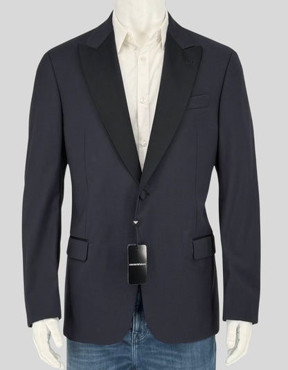 EMPORIO ARMANI G Line single-breasted blazer in sophisticated navy wool. Features notch lapels, single-button closure, welt breast pocket, flap pockets at waist, four-button working cuffs, and single vent back. Fully lined in signature Emporio Armani satin with interior pockets.