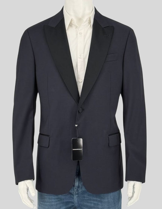 EMPORIO ARMANI G Line single-breasted blazer in sophisticated navy wool. Features notch lapels, single-button closure, welt breast pocket, flap pockets at waist, four-button working cuffs, and single vent back. Fully lined in signature Emporio Armani satin with interior pockets.