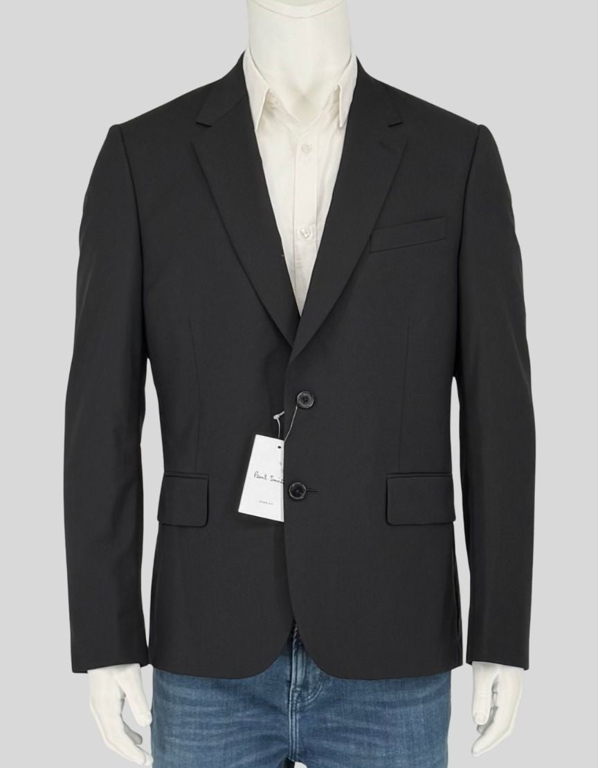 PAUL SMITH black blazer in the modern SOHO fit featuring signature contrast lining in cobalt blue and burnt orange. Italian-made from luxurious wool-mohair blend with two-button closure, notched lapels, and flap pockets. The SOHO fit offers a tailored waist and slightly shorter body length.