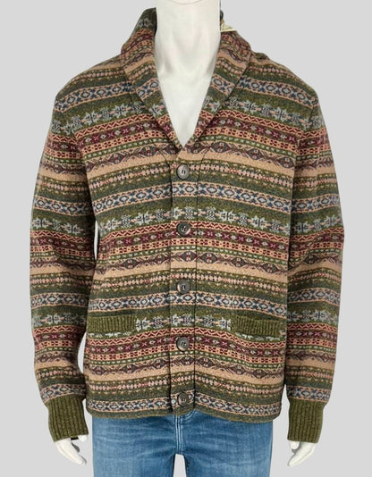 SCHOTT BROS traditional Fair Isle cardigan in classic earth tones featuring intricate geometric patterns in green, burgundy, tan, and navy. Shawl collar, button front closure, and ribbed cuffs and hem. 