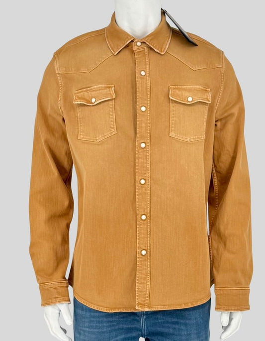 TELERIA ZED Italian-crafted western shirt in warm ochre denim featuring authentic western styling. The Roper style has a western yoke detailing, pearlized snap closures, dual chest pockets with snap flaps, and barrel cuffs. Individually dyed and washed by Italian artisans. 