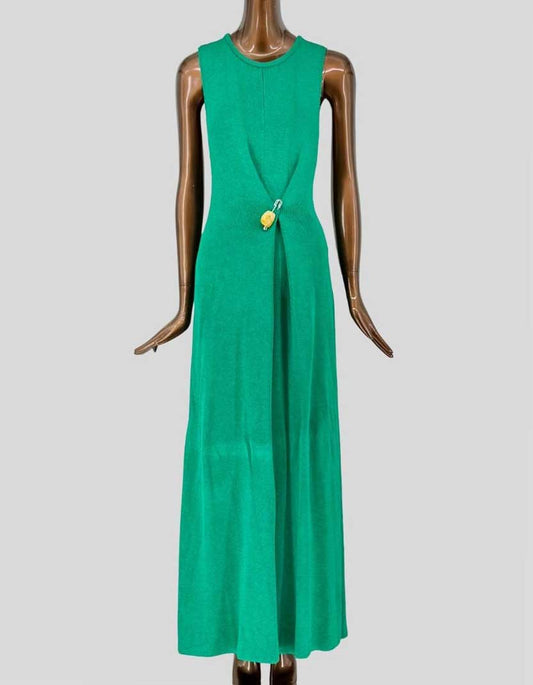 PROENZA SCHOULER sleeveless ribbed knit maxi dress in vibrant kelly green. Features sculptural wrap detail at waist with signature toggle closure creating elegant draping. Fitted bodice flows into relaxed A-line skirt. Fine gauge viscose knit with subtle ribbing throughout. Unlined. Concealed side zip closure.
