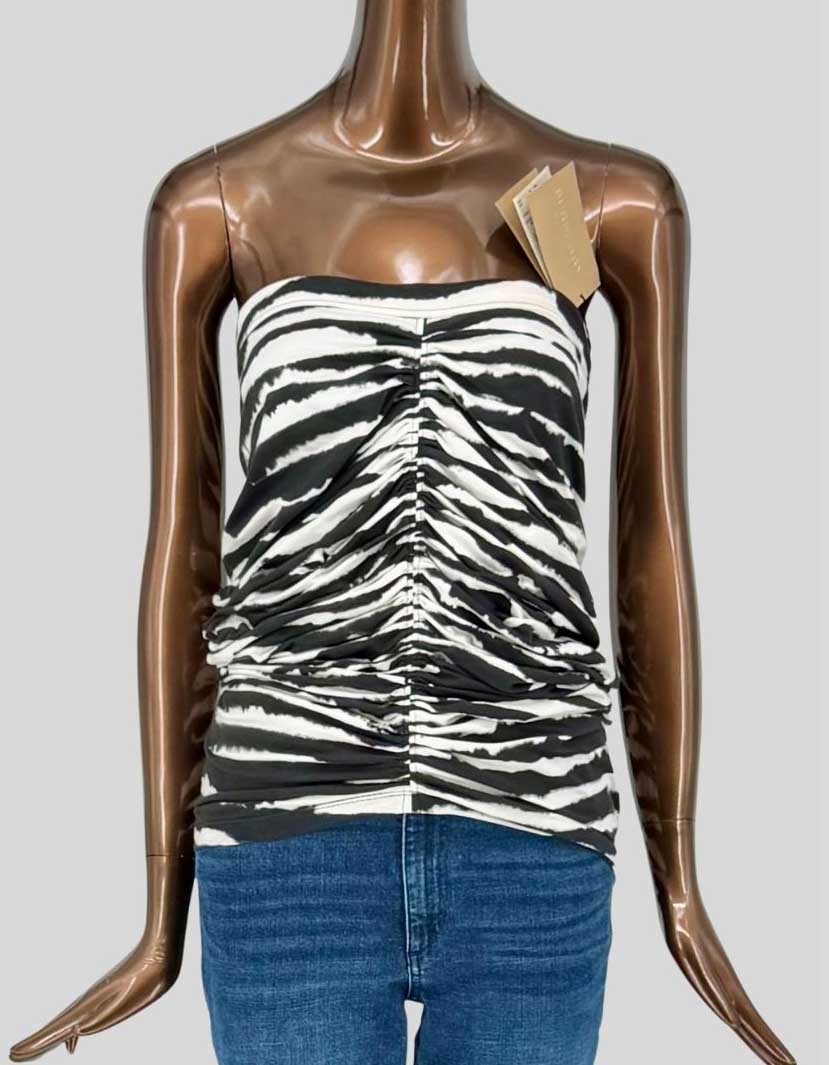 BURBERRY's ruched tube top in a bold black and white zebra print features gathered center-front seaming for a flattering fit. Stretch cotton jersey, strapless silhouette. Full-length back zip closure. 