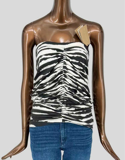 BURBERRY's ruched tube top in a bold black and white zebra print features gathered center-front seaming for a flattering fit. Stretch cotton jersey, strapless silhouette. Full-length back zip closure. 