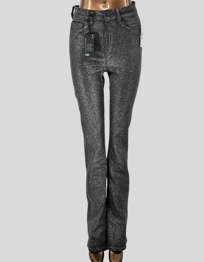 PAIGE's Manhattan High Rise bootcut jean in silver metallic Luxe Coating finish. Transcend fabric offers exceptional stretch and recovery with a leather-like look. Five-pocket styling, zip fly with button closure. 