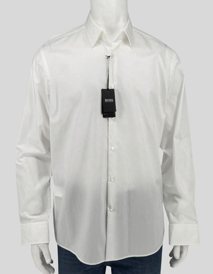 HUGO BOSS Regular Fit dress shirt in crisp white. Point collar, button front, barrel cuffs. Clean, versatile design perfect for business or formal occasions.