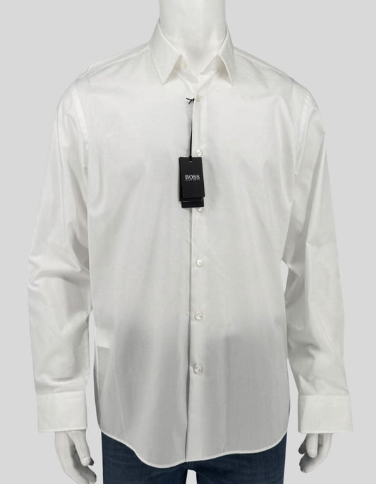 HUGO BOSS Regular Fit dress shirt in crisp white. Point collar, button front, barrel cuffs. Clean, versatile design perfect for business or formal occasions.