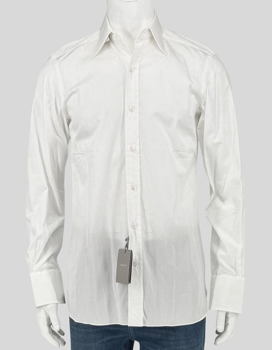 TOM FORD impeccably tailored white dress shirt with a refined point collar, button front, and barrel cuffs. Clean, timeless design in premium cotton with a subtle sheen. 