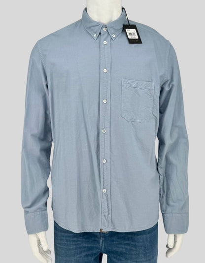BILLY REID signature Tuscumbia washed oxford shirt in light blue. Button-down collar, button front, chest patch pocket, barrel cuffs. Soft, broken-in feel from the washed cotton oxford fabric. 
