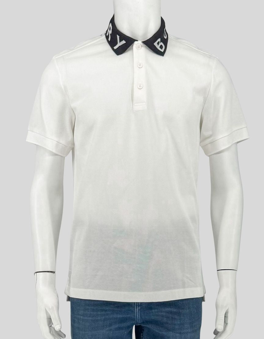 BURBERRY white polo shirt with signature logo-knit collar in black. Cotton piqué construction, three-button placket, short sleeves. The iconic logo collar makes a subtle yet distinctive statement.