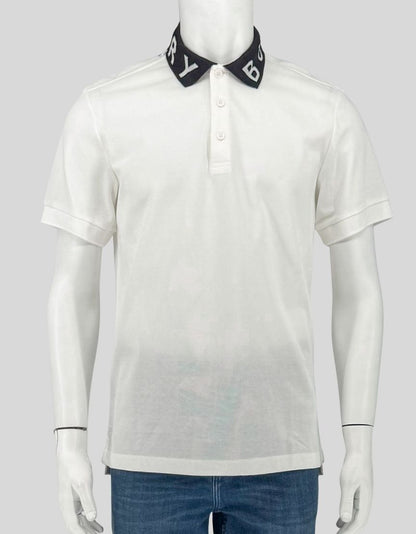 BURBERRY white polo shirt with signature logo-knit collar in black. Cotton piqué construction, three-button placket, short sleeves. The iconic logo collar makes a subtle yet distinctive statement.