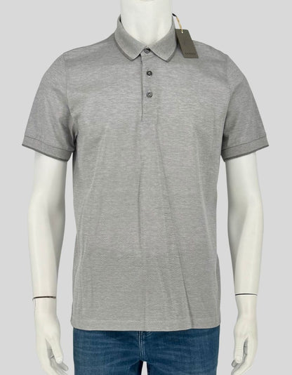 CANALI grey polo shirt in 100% cotton piqué. Three-button placket, short sleeves, ribbed collar and sleeve trim. 