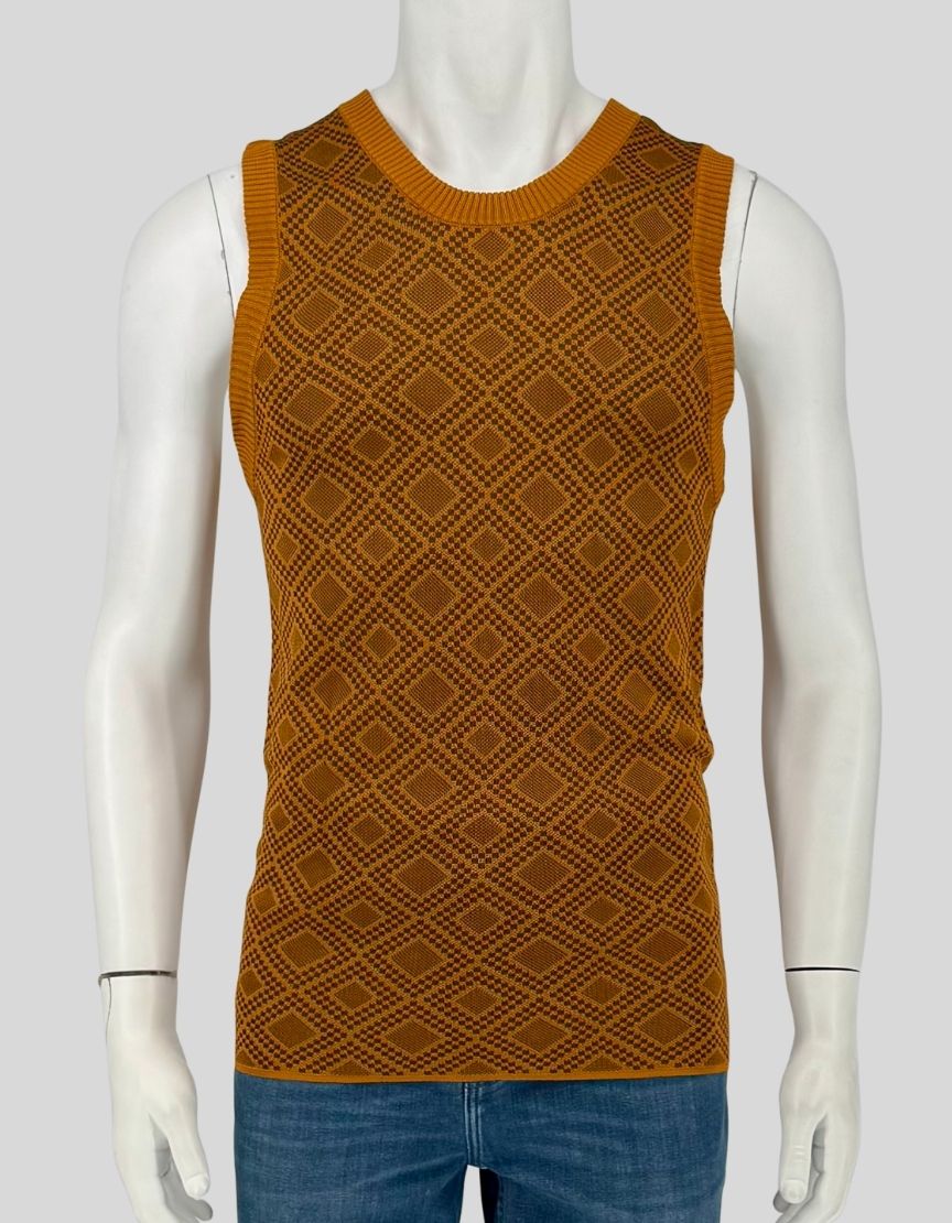 AHLUWALIA Kingpin knitted vest in ochre with geometric diamond jacquard pattern. Sleeveless silhouette, crewneck, ribbed trim at neck, armholes, and hem. 