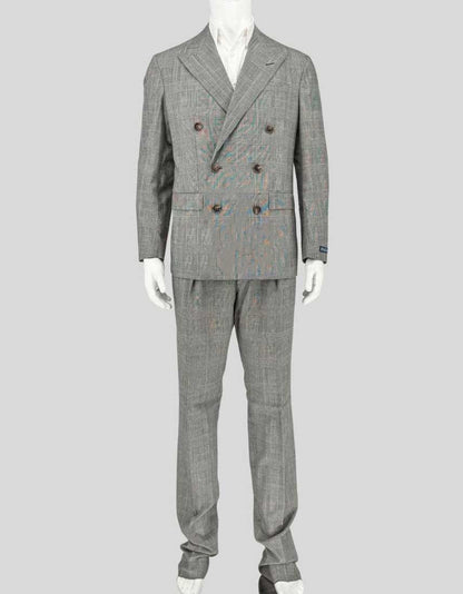 POLO RALPH LAUREN double-breasted suit in classic glen plaid — the timeless Prince of Wales check pattern rendered in sophisticated black and grey. From Ralph Lauren's elevated Classics collection, this six-button (3x2) silhouette features peak lapels, flap pockets, and a fitted structure. Lightweight 100% wool that drapes beautifully and offers year-round versatility.